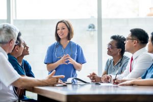 Nurse talking to colleagues