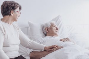 Caring senior woman and husband