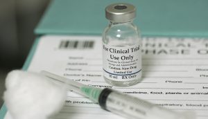Clinical trial bottle and needle.