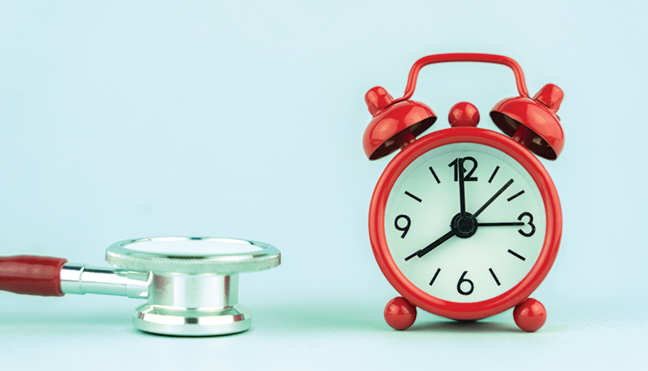 stethoscope and alarm clock