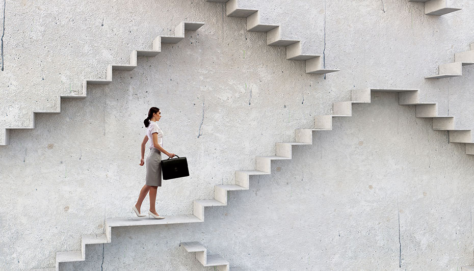 Manager climbing stairs